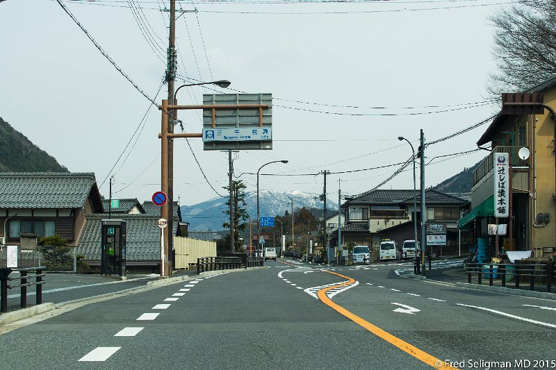 20150313_110854 D3S.jpg - About 1 hour north of Kyoto snow on the mountain.  Probably Mount Hiei-zan in background